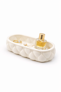 Tufted catch tray